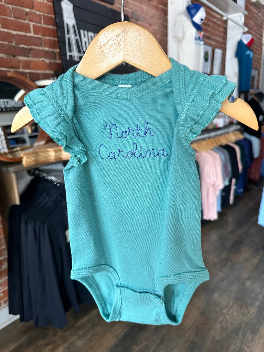 North Carolina Embroidered Onesie in Teal
