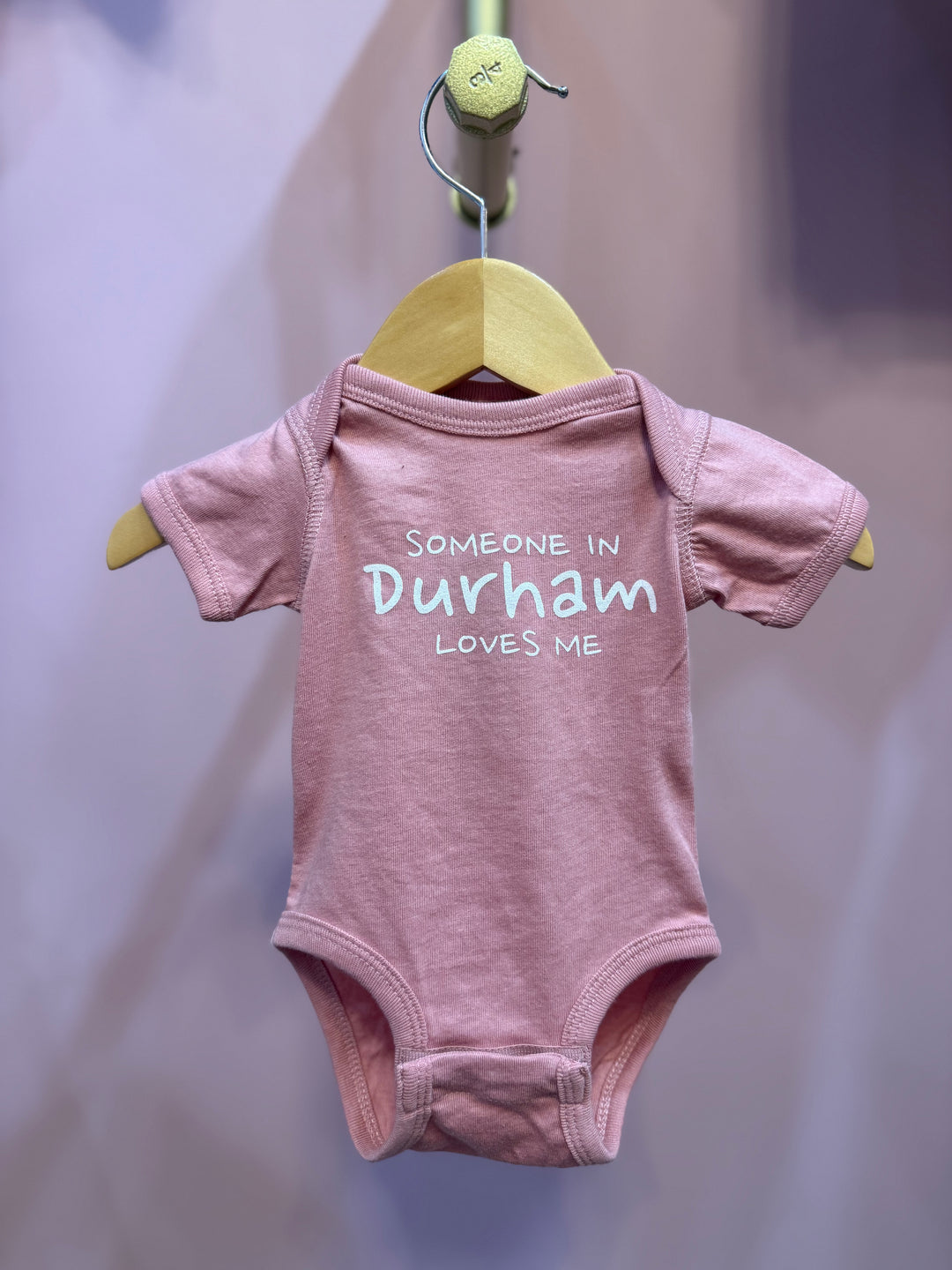 Someone in Durham Loves Me Onesie #91 (Vintage Mauve)